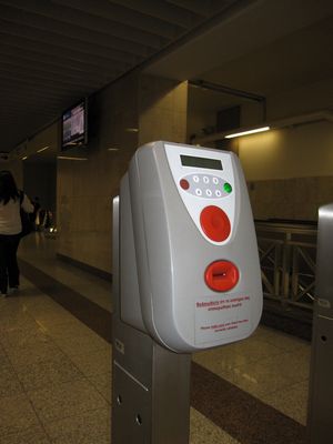 Before you get to the metro platform, you will need to insert and retrieve your ticket from one of these machines.