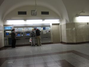 When you get down to the ticket level, you can buy tickets from the ticket machines along the wall.