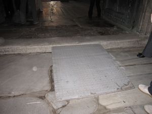 This is the 2nd ramp at the entrance.  It leads up but there is no ramp leading down so you will have to go down one step.