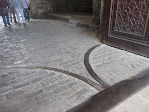 The entrance to the first courtyard has some uneven ground.