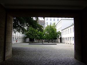 Go through this tunnel into the courtyard and you are at the site where the Valkyrie conspirators against Hitler were executed.  The entrance with a single step is on the left side of the courtyard.