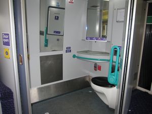 Generally each train will have a train car with a wheelchair accessible restroom.