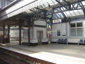 While on the train, look for signs like this one in Stirling, UK so that you know which station to get off at.