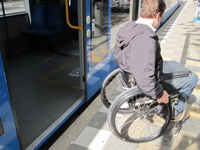 John Sage using an Amsterdam tram